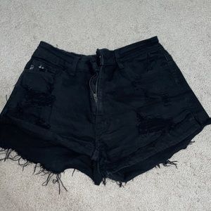 Distressed black ripped jean shorts